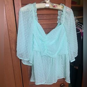 Swiss Dot Ruched Sweetheart Neck Flutter Sleeve Peplum Blouse